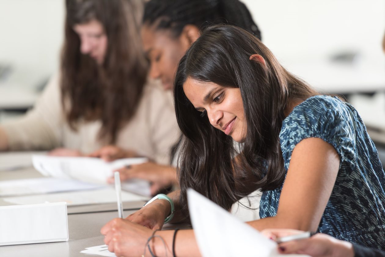 Students writing in class