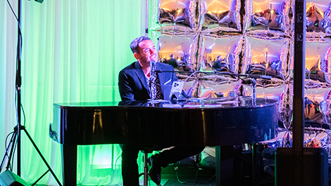 Brenner Campos plays the piano at Homecoming.