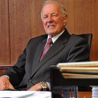 David Flynn sits at a desk.