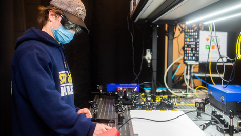 Peyton brown works in a photonics lab.