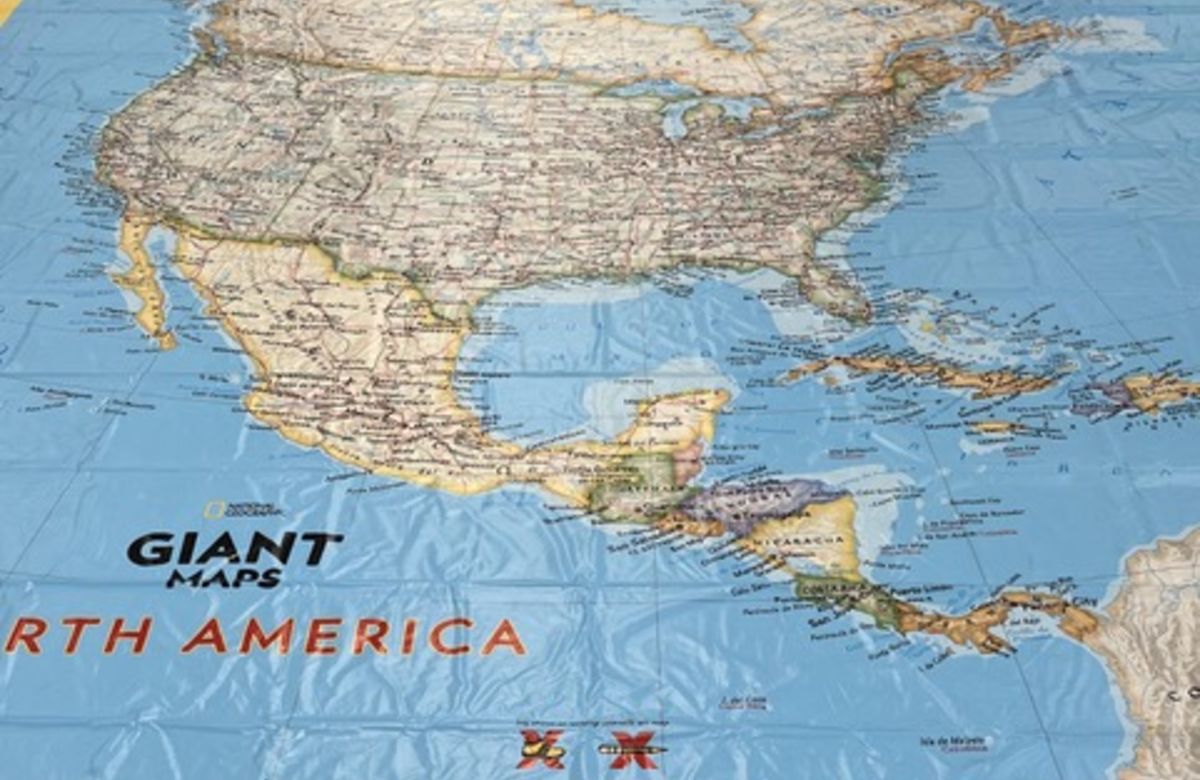 An overhead shot of a giant map of North America
