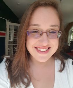 Image of a female wearing glasses