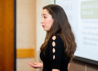 Dr. Sidita Kushi lecturing in class