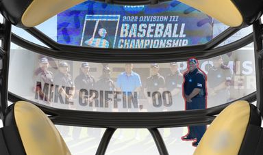 A look out from an umpire mask to view an image of Mike Griffin
