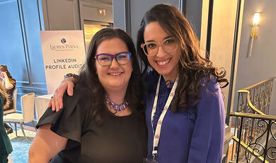 Laura Viola Maccarone and Stephanie Boyle embrace.