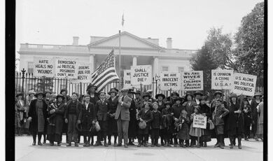 A group of adults and children gathered in front of the White House in 1922 to protest for political amnesty