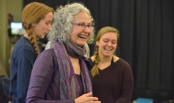 Faculty member smiling