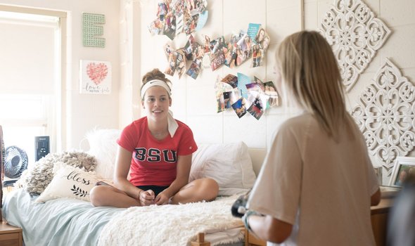 students in dorm room