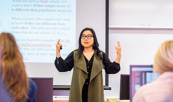 Professor Hannarae Lee teaching a class on analyzing criminal data