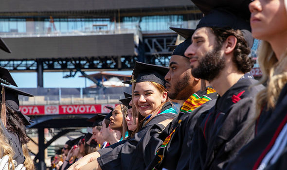 A row of graduates at the commencement ceremony