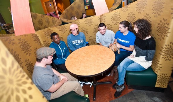 students and mentors in cafeteria
