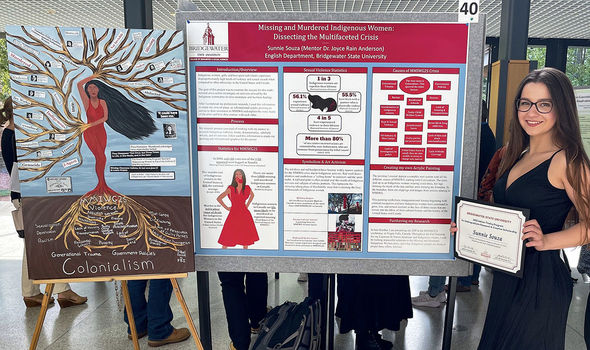 Sunnie Souza, ’23, in front of her symposium presentation on the missing and murdered Indigenous women crisis