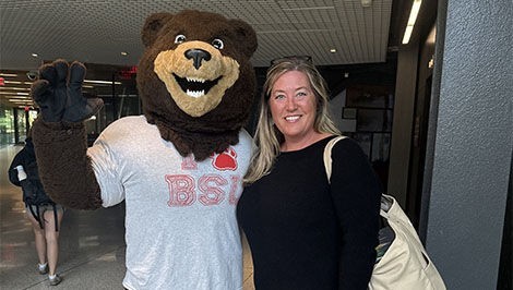 Jill Milton poses for a photo with Bristaco.