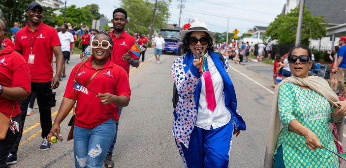 Mandela fellows march in an Independence Day parade.